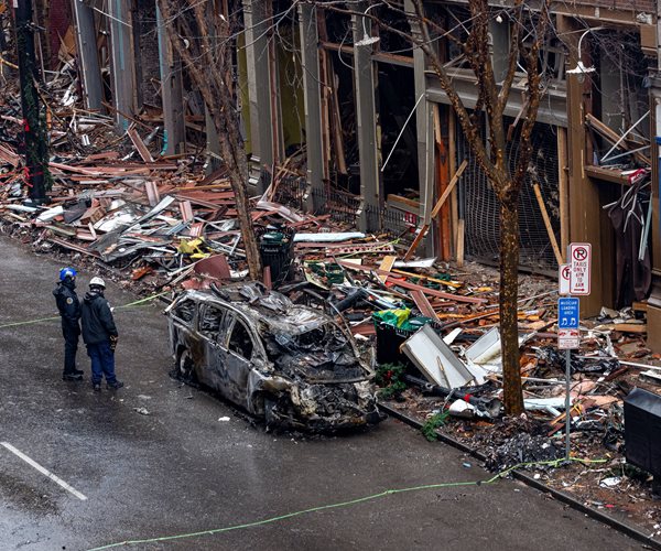 aerial view of police at scene of explosion