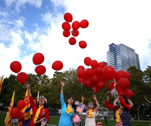 people release red balloons 