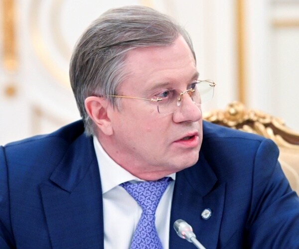 Vitaly Savelyev attends a meeting