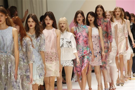 Chanel Touts Luxury Travel Dressed up in Massive Checks