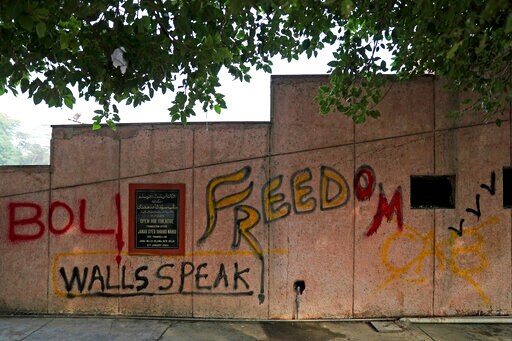 AP Photos: Graffiti at Indian Campus Slam Citizenship Law