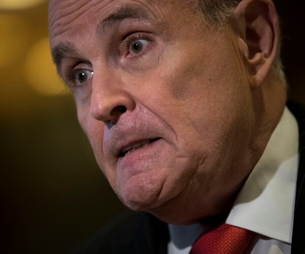 rudy giuliani speaks with reporters