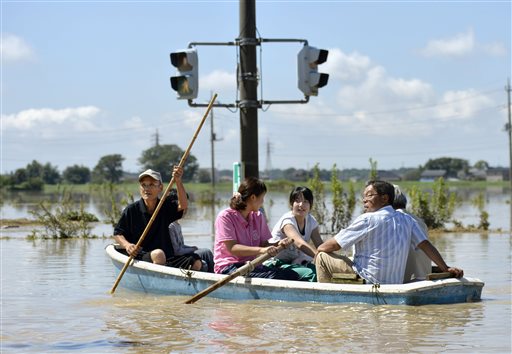 Shocked City Assesses Flood Damage in Japan; 22 Missing