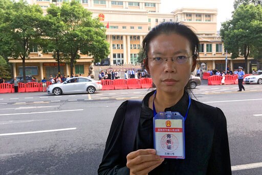 The Latest: Taiwan Activist Pleads Guilty in China