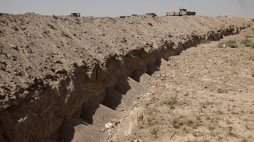 AP EXCLUSIVE: Iraq Digs Security Trench around Fallujah