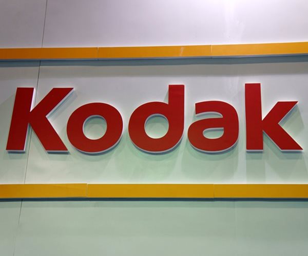 2 Charged With Insider Trading on Kodak COVID News