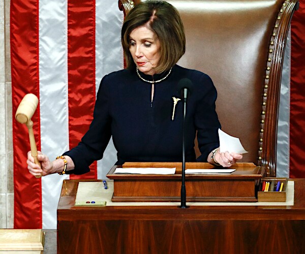nancy pelosi bangs the gavel as the head of the house