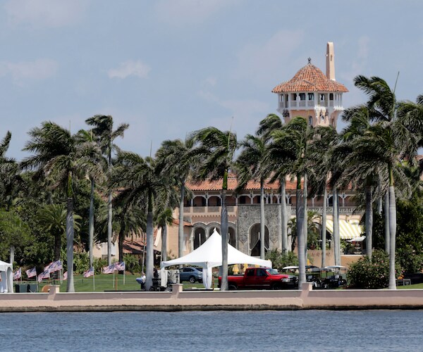 a view of mar-a-lago across the water in palm beach, florida