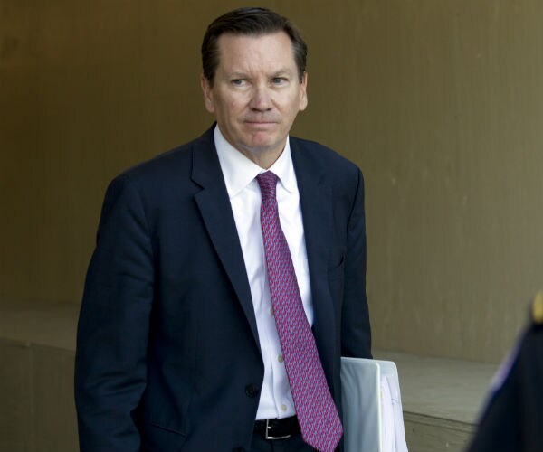 michael atkinson is shown leaving the us capitol