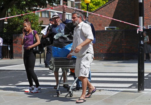 The Latest: London Fire Donations Overwhelming Centers