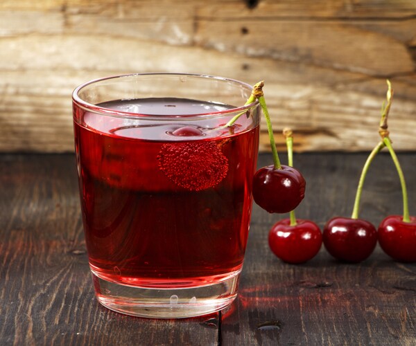 a glass of cherry juice