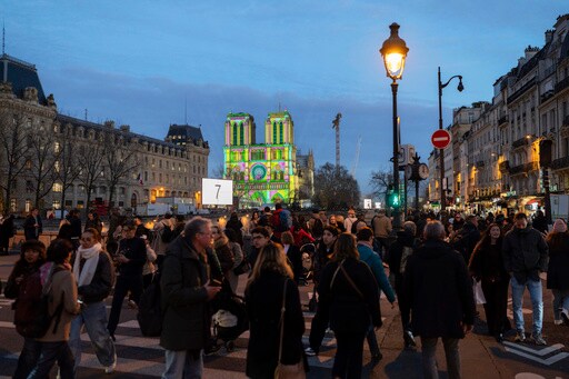 Famed Notre Dame Cathedral in Paris Reopens to Great Fanfare