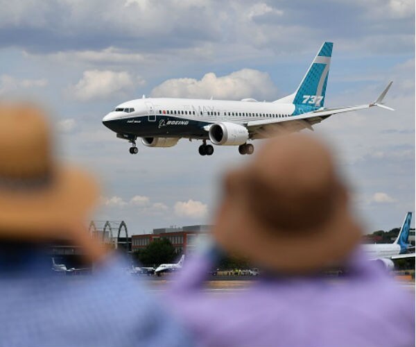 Boeing Lifts Industry Demand Forecast as Air Show Deals Roll on