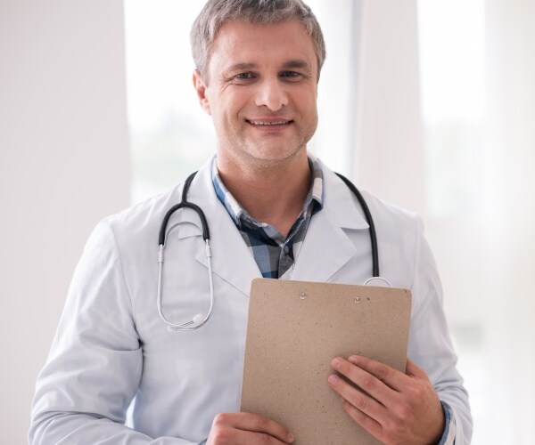 doctor smiling at camera