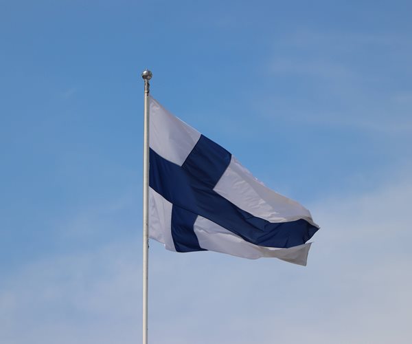 Finnish flag on a flagpole