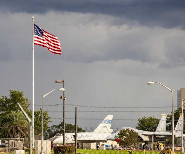 united states air force base near a city or town of the sunshine state cloud planes and flag 