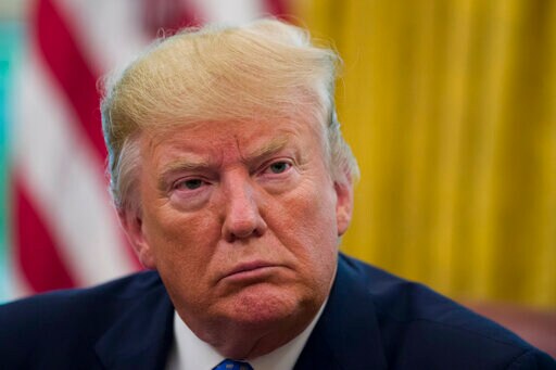 The Latest: Trump Lashes out again at UK Ambassador