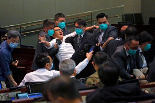 Hong Kong Lawmakers Arrested Over Disruption of Legislature