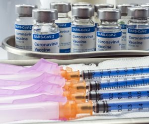 Participants in Coronavirus Vaccine Trials Report Fever ...