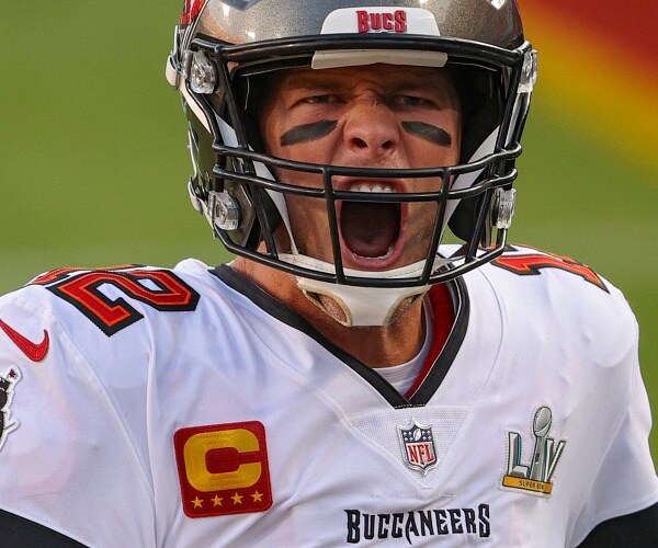 tom brady screams walking onto football field