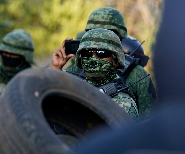 Mexico's Drug War Uses Drones, Human Shields, Gunships