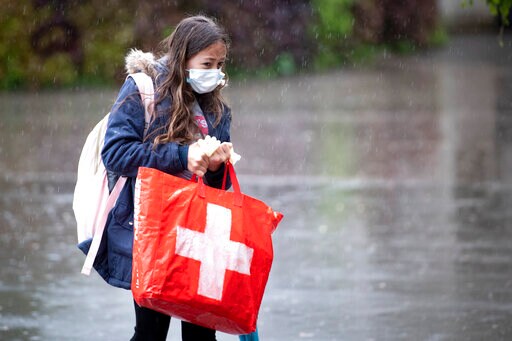 Swiss Vote on COVID Law amid Sharp Rise in Infections