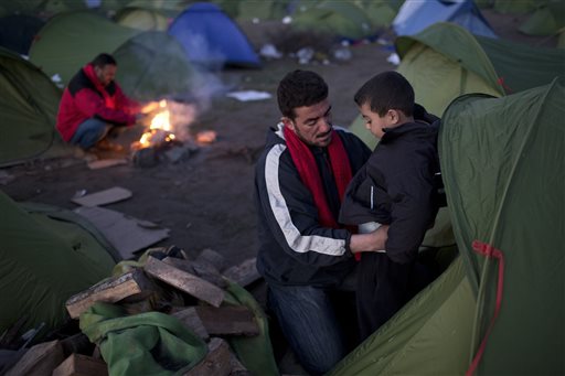The Latest: Greece Maintains Threat to Act Alone on Migrants