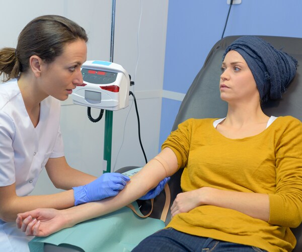 a woman undergoing cancer treatment
