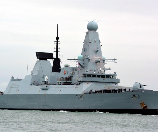 The Royal Navy destroyer sailing in the sea
