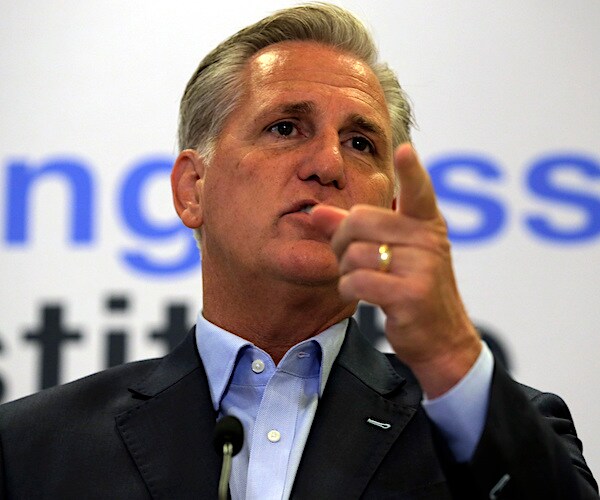 kevin mccarthy points during a news conference