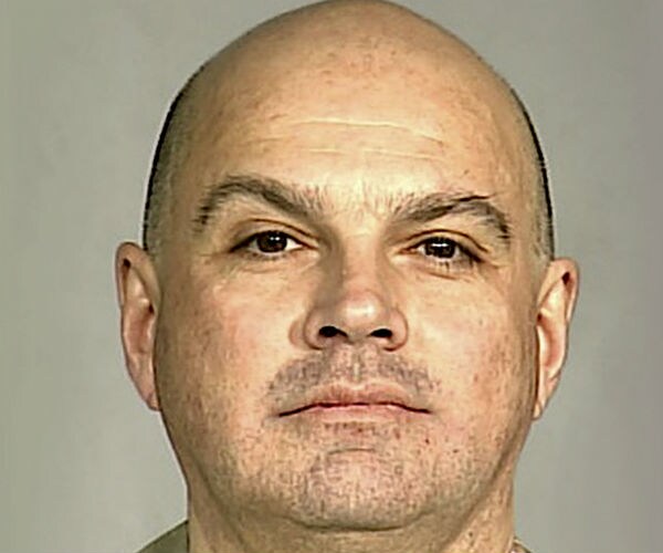 Lawrence Ray is shown in a U.S. Attorney's office  mug shot pic