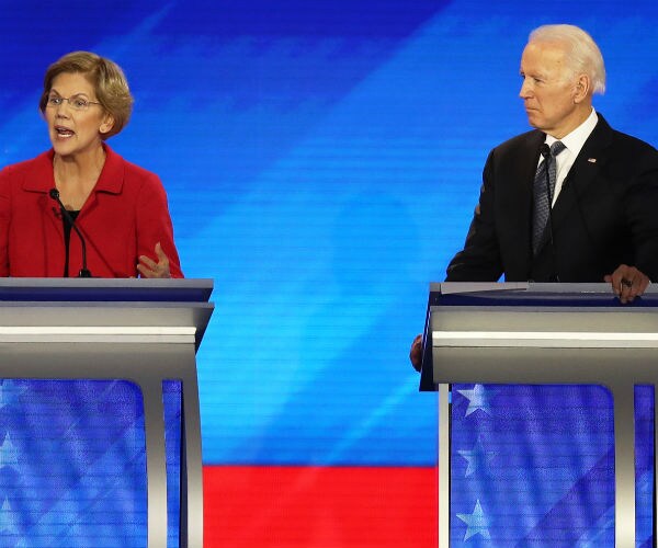 elizabeth warren and joe biden participate in a primary debate at st. anselm college in new hampshire