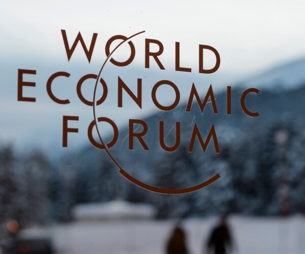 The logo of the World Economic Forum seen on a window pane