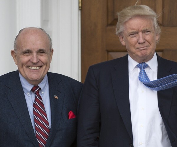 rudy giuliani and donald trump stand outside his gold course clubhouse in new jersey