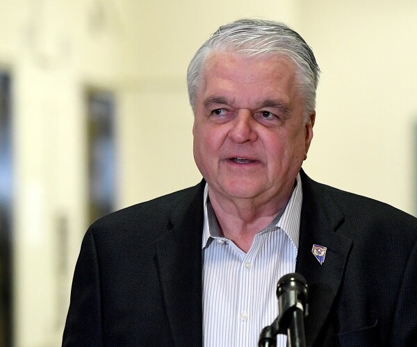 steve sisolak speaks at press conference
