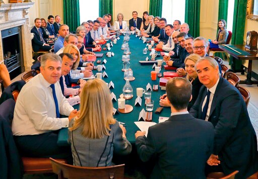 The Latest: Trump Says May's Plan Wrecks Brexit, US Deals