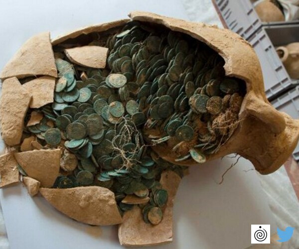 Half Ton of Roman Coins Found Stored in Ancient Jars in Spain