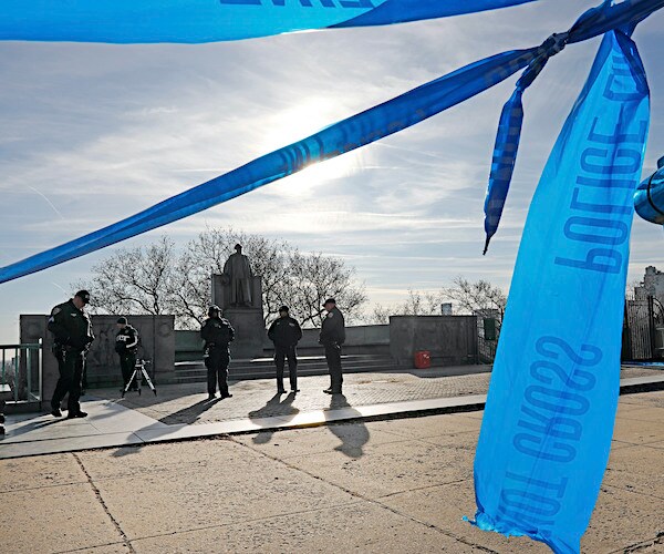 police tape mark the crime scene in a manhattan park