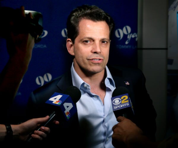 anthony scaramucci speaks to a gaggle of media and cameras