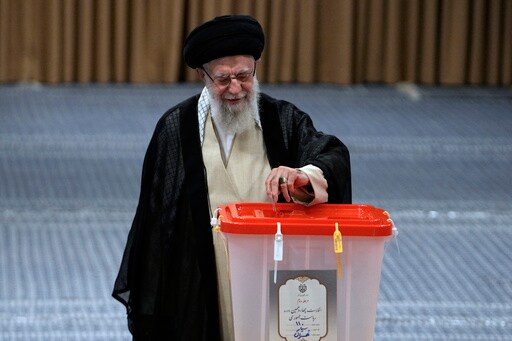 Iran Holds Runoff Presidential Vote Pitting Hard-line Former Negotiator against Reformist Lawmaker