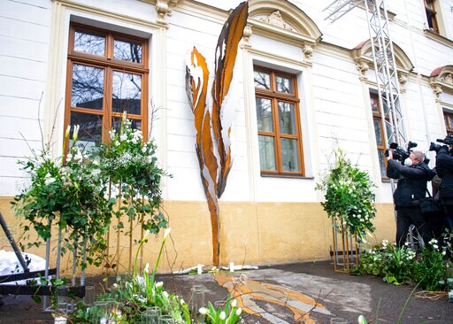 Slovaks Unveil Monument to Slain Journalist and His Fiancee