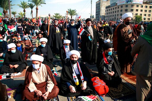 Demonstrators in Iraq Take to Street Unmasked amid Pandemic