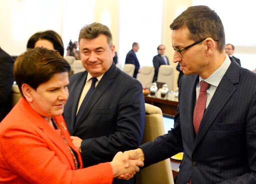 Poland's Outgoing PM Vows to Keep Serving Populist Gov't