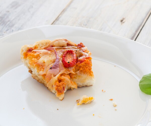 leftover pizza on a plate