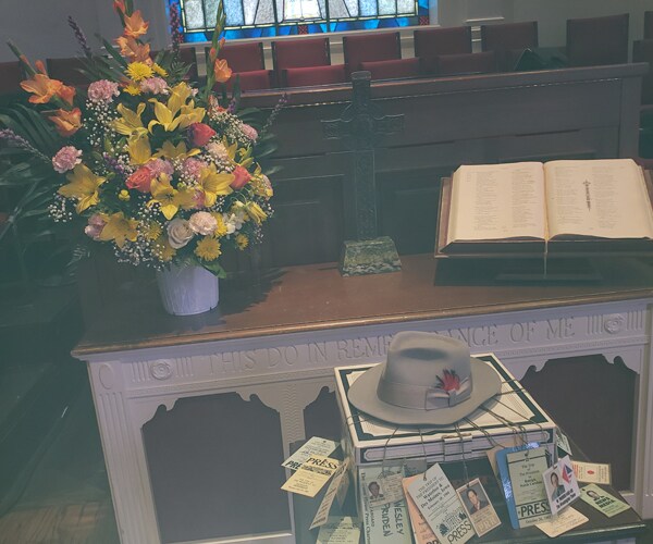 Wes Pruden's trademark fedora and press passes