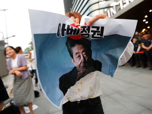 The Latest: S. Korean Man Dies of Burns near Japan Embassy