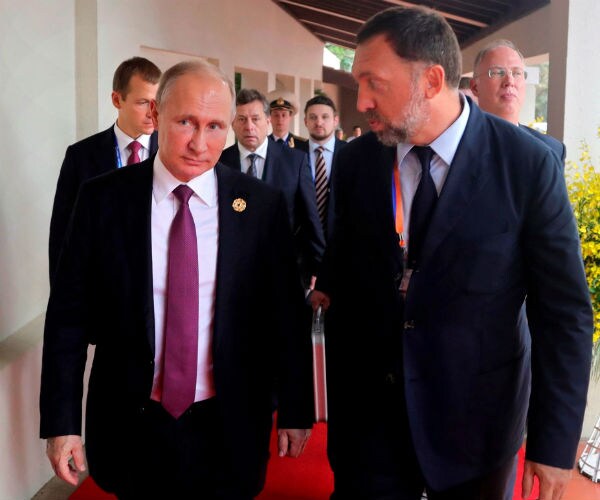 russian president vladimir putin and russian oligarch oleg deripaska