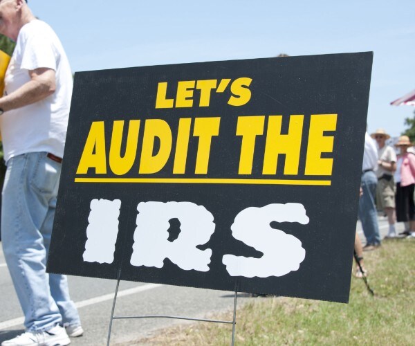 protesters in front of an irs office 
