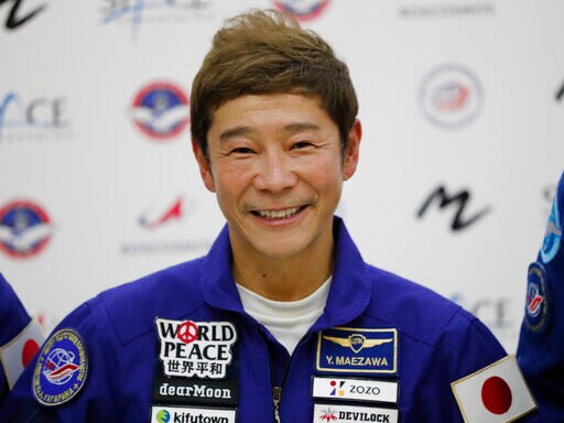 The AP Interview: Japanese Tourist Says Space Trip 'amazing'