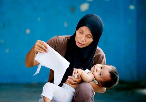Filipinos Set to Vote: Slow Reform or Promise of Big Change?